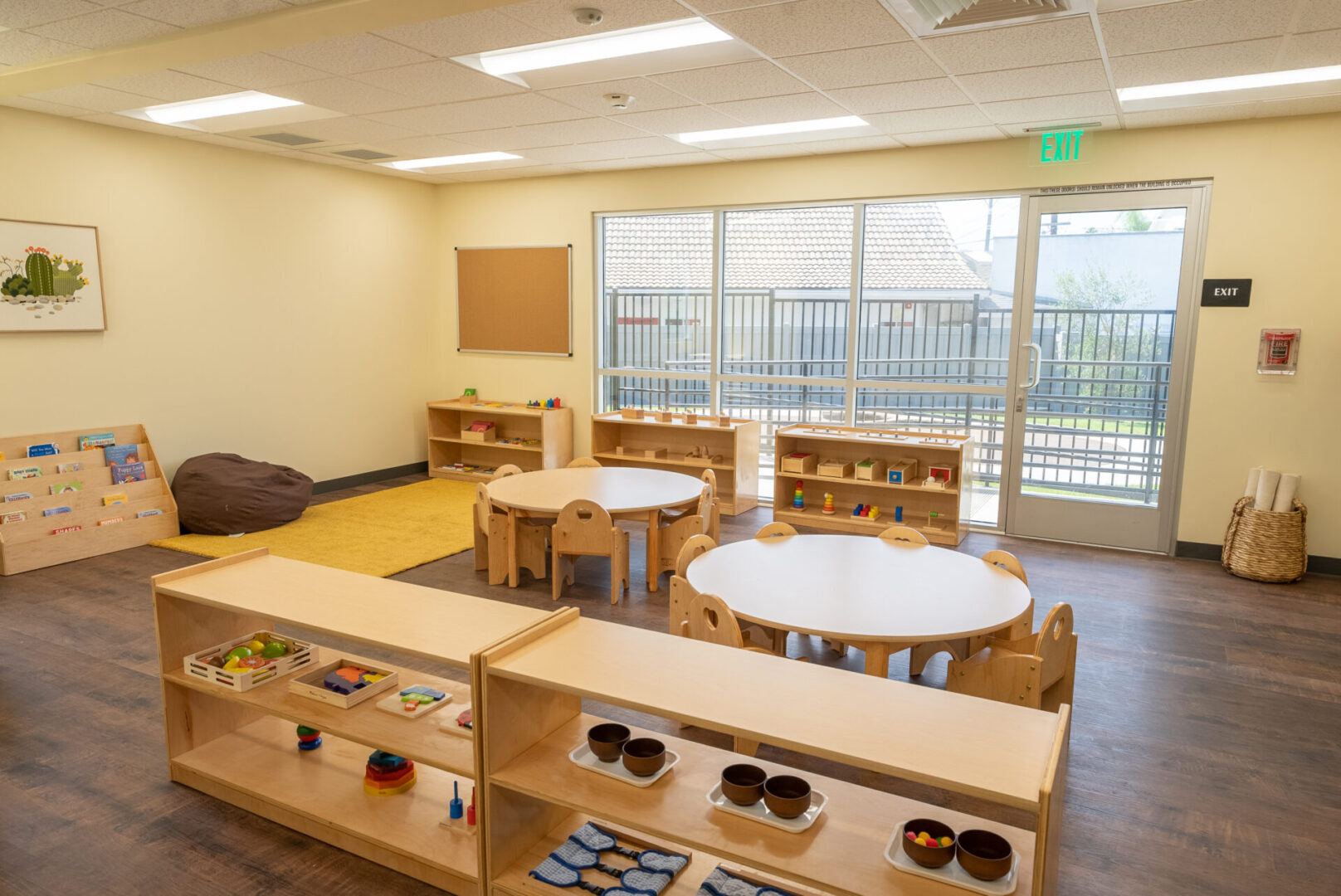 A room with tables and chairs in it